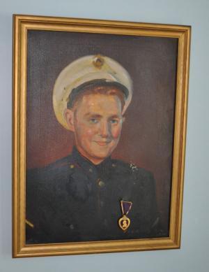This portrait of Allen MacQuarrie in Marine regalia, done by a contemporary, Edward Vickers, is a family treasure. Allen’s mother affixed his Purple Heart medal to the art work, saying, “That’s where it belongs.”